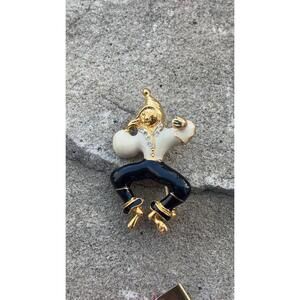 Vintage black & white enamel rhinestone gold tone 2-1/4” jester brooch